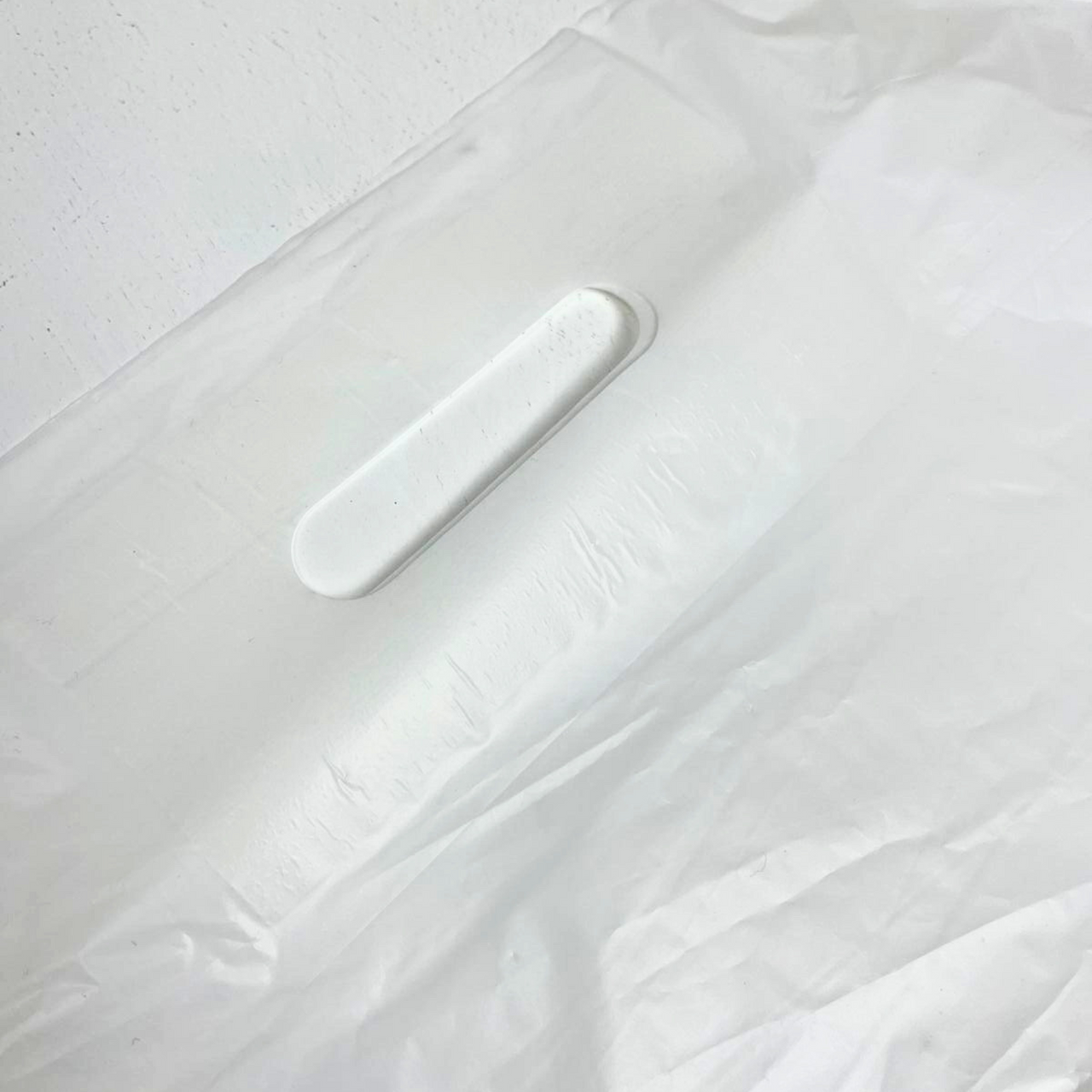 14" x 14" Strong White Patch Handle Plastic Carrier Bag with reinforced handles, available in packs of 100 or boxes of 1000