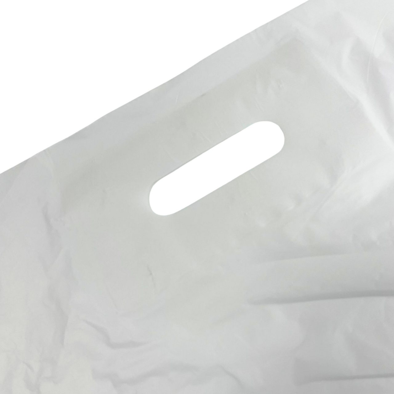 Our 15" x 18" Strong White Patch Handle Plastic Carrier Bag combines durability and elegance, with reinforced handles for easy carrying. Perfect for any retail setting, it ensures a secure and stylish transport of your products.