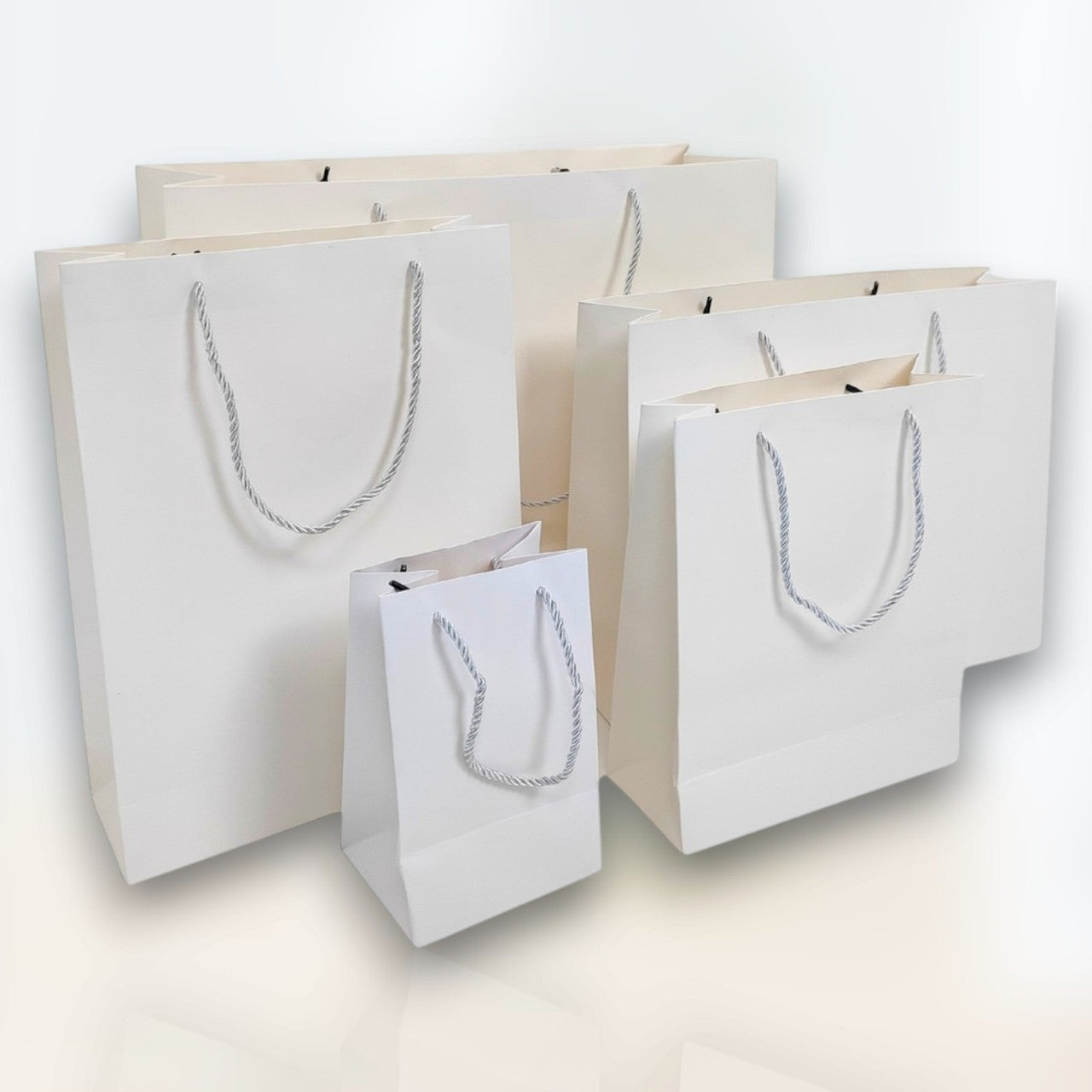 White Paper Carrier Bags with Rope Handles – Various Sizes and Matt Finishes