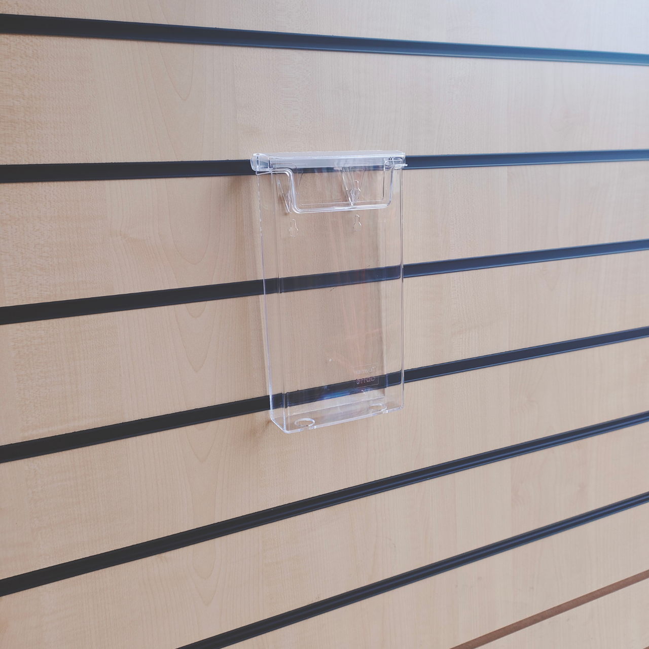 Outdoor weather-resistant DL leaflet holder for effective display in Slatwall systems, injection-molded for durability